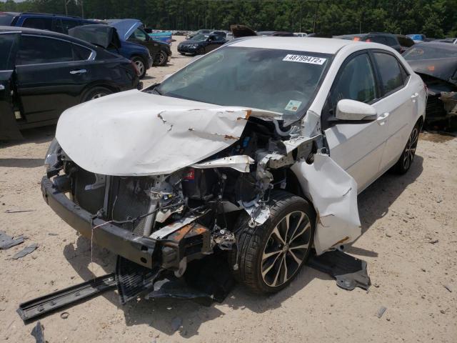 Photo 2 from auction – 2018 TOYOTA COROLLA L with VIN 5YFBURHE0JP784009