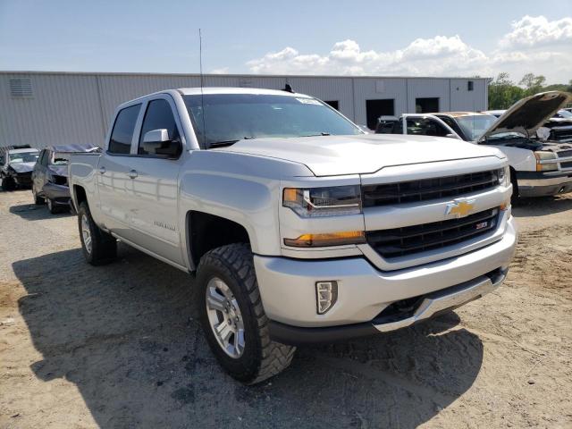 CHEVROLET SILVERADO 2018 with VIN 3GCUKRECXJG165697 - Photo from auction