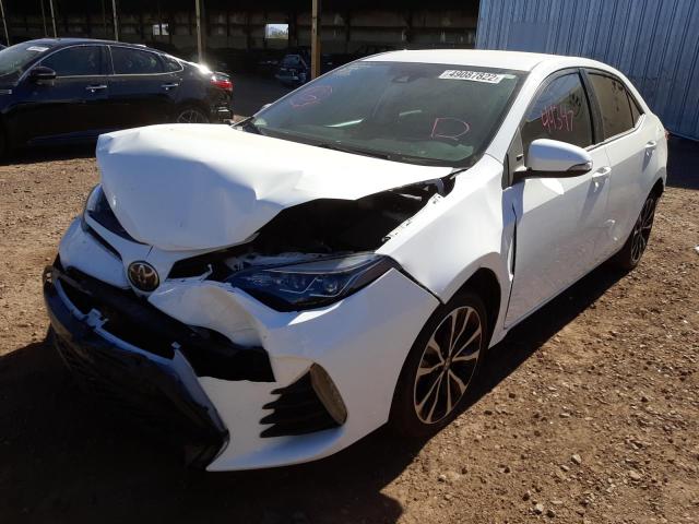 Photo 2 from auction – 2017 TOYOTA COROLLA L with VIN 5YFBURHE3HP675232