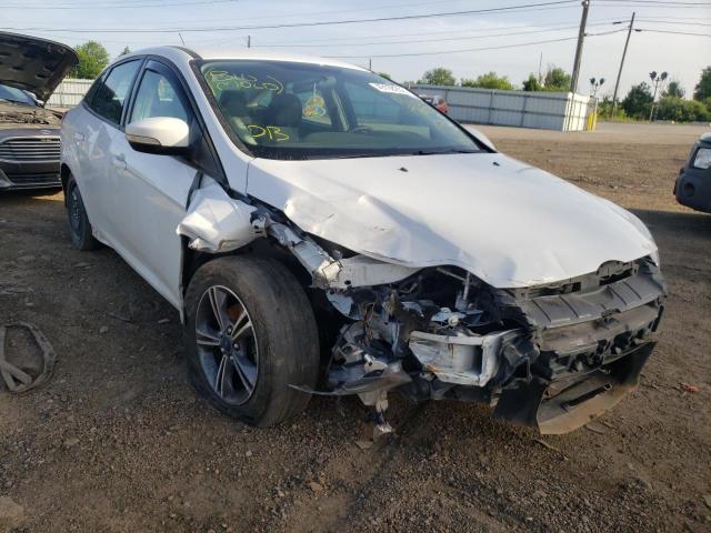 FORD FOCUS SE 2014 with VIN 1FADP3F22EL357828 - Photo from auction