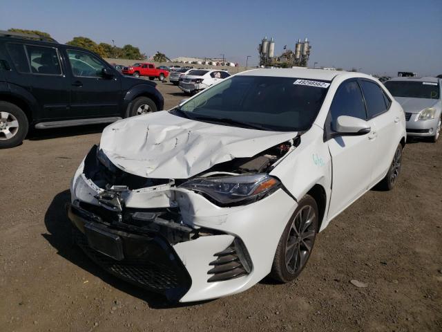 Photo 2 from auction – 2018 TOYOTA COROLLA L with VIN 5YFBURHE2JP794783