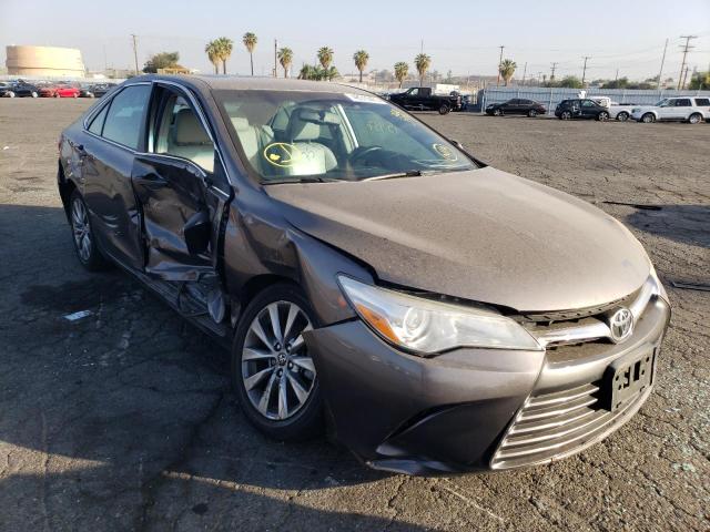 TOYOTA CAMRY LE 2017 with VIN 4T1BF1FK2HU673474 - Photo from auction