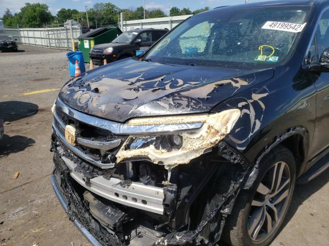 Photo 9 from auction – 2017 HONDA PILOT ELIT with VIN 5FNYF6H06HB014300