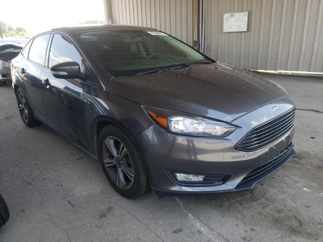FORD FOCUS SE 2017 with VIN 1FADP3FE3HL295189 - Photo from auction