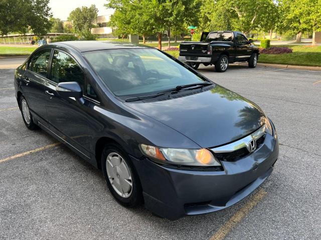 HONDA CIVIC HYBR 2010 with VIN JHMFA3F24AS001643 - Photo from auction