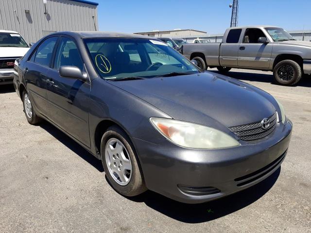 TOYOTA CAMRY LE 2003 with VIN 4T1BF32K23U563938 - Photo from auction