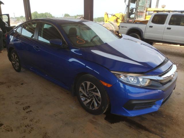 HONDA CIVIC EX 2018 with VIN 19XFC2F79JE000069 - Photo from auction