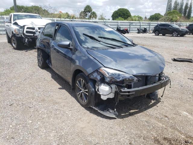 TOYOTA COROLLA L 2018 with VIN 5YFBURHE7JP842049 - Photo from auction
