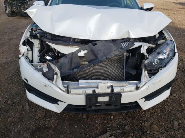 Photo 9 from auction – 2018 HONDA CIVIC EX with VIN 19XFC2F74JE016664