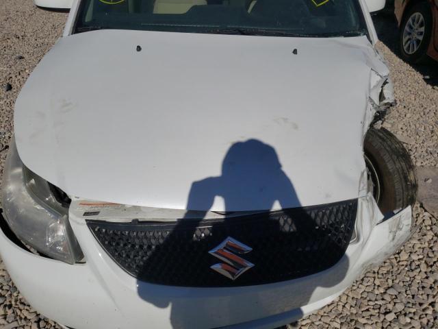 Foto 7 de la subasta – 2013 SUZUKI SX4 LE con VIN JS2YC5A34D6100899