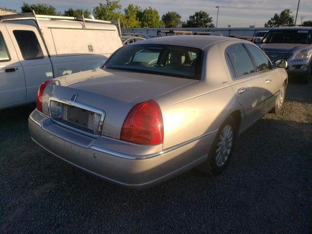 Photo 4 from auction – 2004 LINCOLN TOWN CAR E with VIN 1LNHM81W44Y629921