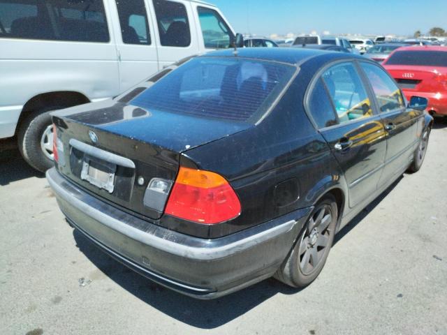 Photo 4 from auction – 2000 BMW 3 SERIES with VIN WBAAM334XYCD57589