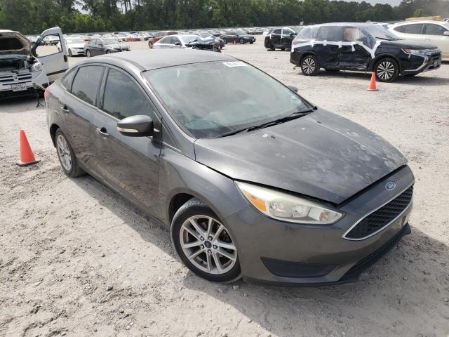 FORD FOCUS SE 2015 with VIN 1FADP3F20FL230898 - Photo from auction