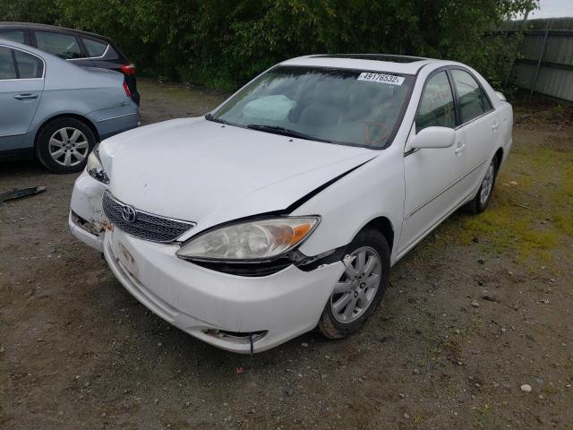 Photo 2 from auction – 2003 TOYOTA CAMRY LE with VIN JTDBF30K130121358