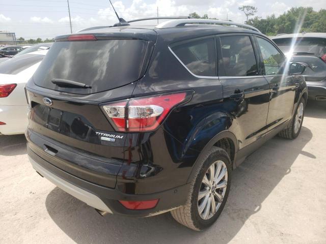 Photo 4 from auction – 2018 FORD ESCAPE TIT with VIN 1FMCU9J90JUD12795