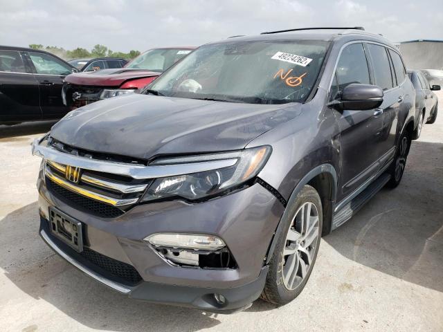 Photo 2 from auction – 2017 HONDA PILOT ELIT with VIN 5FNYF6H00HB023624