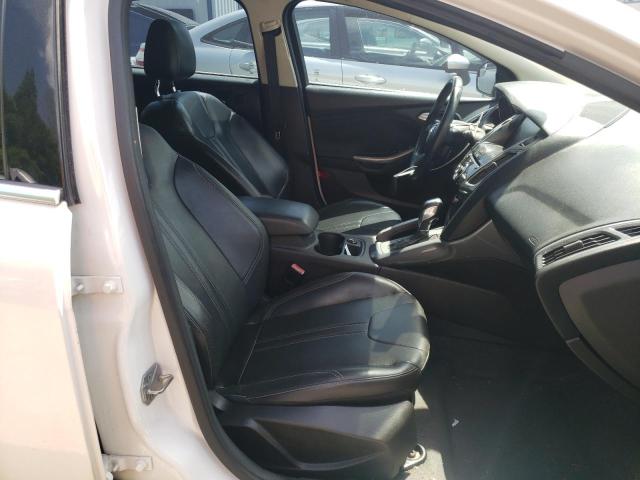 Photo 5 from auction – 2012 FORD FOCUS TITA with VIN 1FAHP3N25CL129774