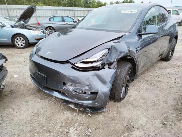 TESLA MODEL Y 2022 with VIN 7SAYGDEE9NF386357 - Photo from auction