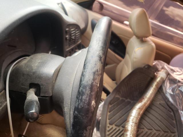 Photo 8 from auction – 1998 CHRYSLER SEBRING LX with VIN 4C3AU52N7WE112145