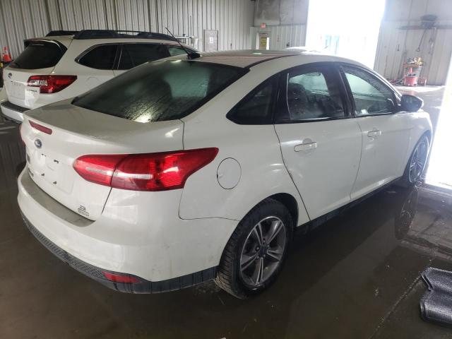 Photo 4 from auction – 2018 FORD FOCUS SE with VIN 1FADP3FE3JL263946