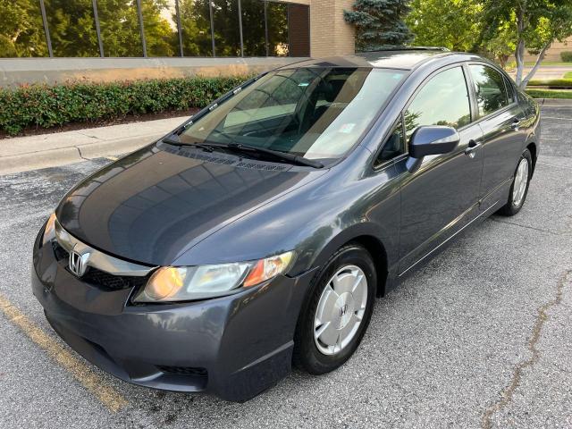 Photo 2 from auction – 2010 HONDA CIVIC HYBR with VIN JHMFA3F24AS001643
