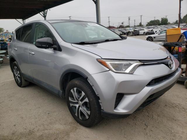 TOYOTA RAV4 LE 2018 with VIN 2T3ZFREV5JW412281 - Photo from auction