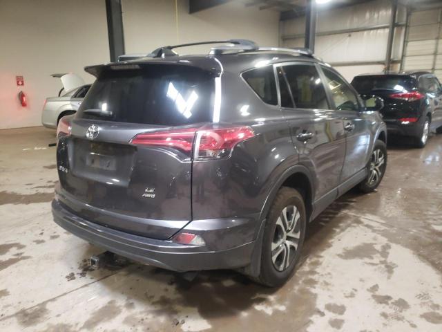 Photo 4 from auction – 2018 TOYOTA RAV4 LE with VIN JTMBFREV6JJ219072