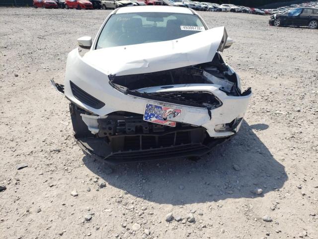 Photo 9 from auction – 2015 FORD FOCUS SE with VIN 1FADP3K26FL288407