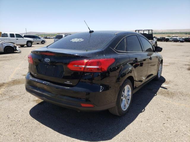 Photo 4 from auction – 2016 FORD FOCUS SE with VIN 1FADP3F21GL380293