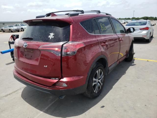 Photo 4 from auction – 2018 TOYOTA RAV4 LE with VIN 2T3ZFREV6JW433737