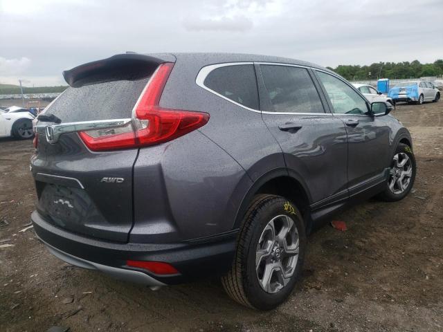 Photo 4 from auction – 2018 HONDA CR-V EXL with VIN 2HKRW2H85JH668487