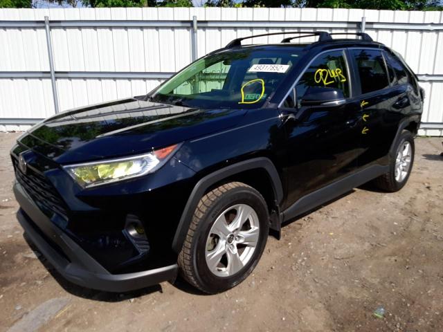 Photo 2 from auction – 2020 TOYOTA RAV4 XLE with VIN JTMP1RFV8LD067123