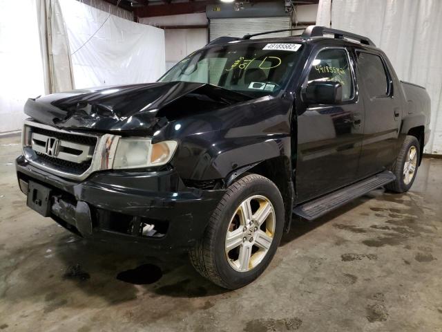 Photo 2 from auction – 2010 HONDA RIDGELINE with VIN 5FPYK1F51AB010729