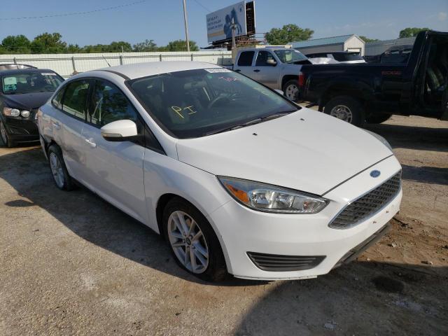 FORD FOCUS SE 2015 with VIN 1FADP3F20FL261424 - Photo from auction