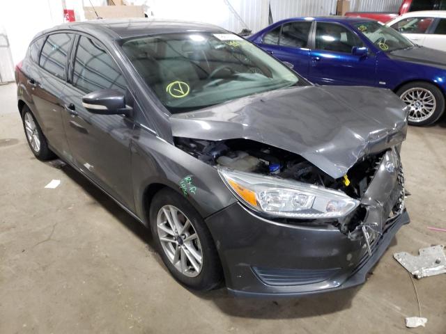 FORD FOCUS SE 2015 with VIN 1FADP3K27FL202697 - Photo from auction