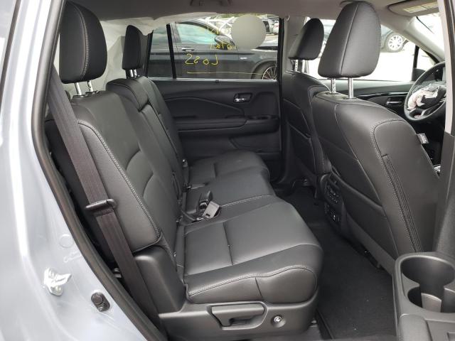 Photo 6 from auction – 2022 HONDA PILOT TOUR with VIN 5FNYF5H98NB013704