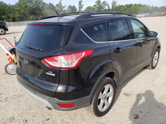 Photo 4 from auction – 2014 FORD ESCAPE SE with VIN 1FMCU0GX0EUB56619