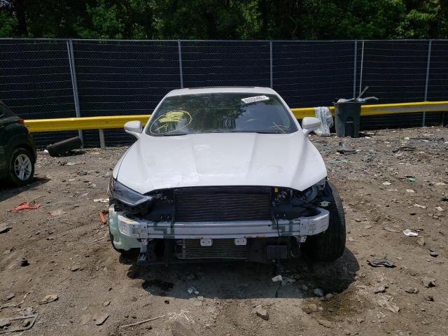 Photo 9 from auction – 2019 FORD FUSION TIT with VIN 3FA6P0RU8KR119998
