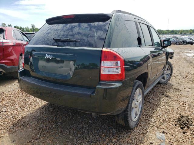 Photo 4 from auction – 2010 JEEP COMPASS SP with VIN 1J4NT4FA3AD582118