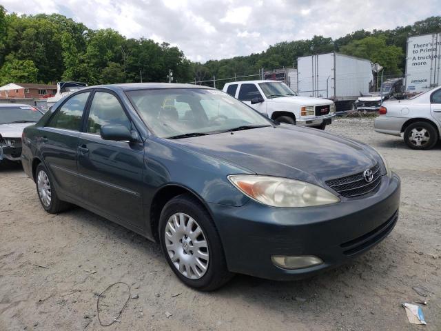 TOYOTA CAMRY LE 2003 with VIN 4T1BE30K23U700818 - Photo from auction