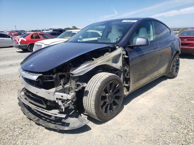 Photo 2 from auction – 2021 TESLA MODEL Y with VIN 5YJYGAEEXMF212730
