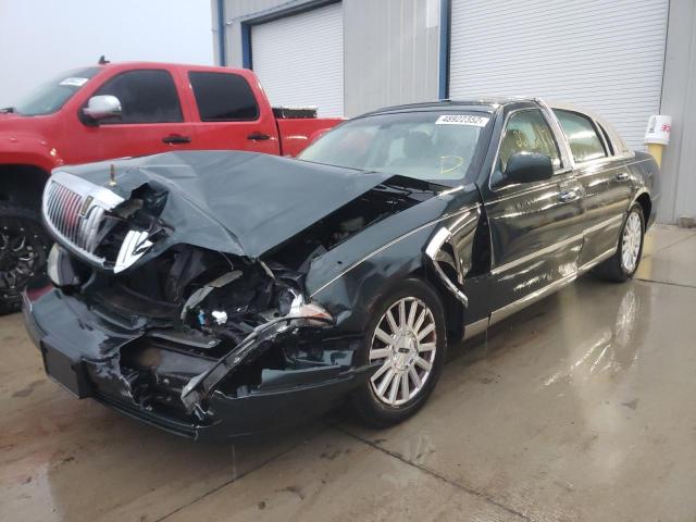 Photo 2 from auction – 2003 LINCOLN TOWN CAR E with VIN 1LNHM81W83Y634862