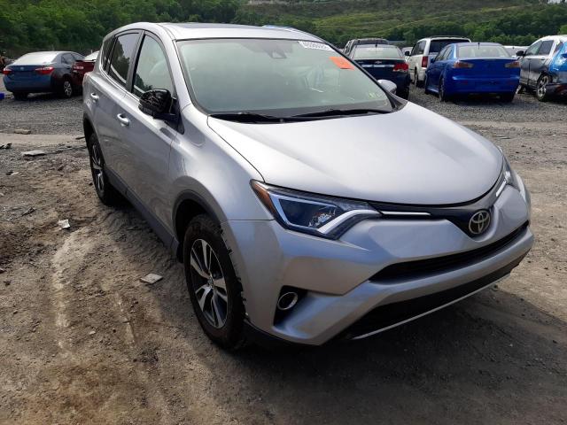 TOYOTA RAV4 ADVEN 2018 with VIN 2T3RFREV3JW815899 - Photo from auction