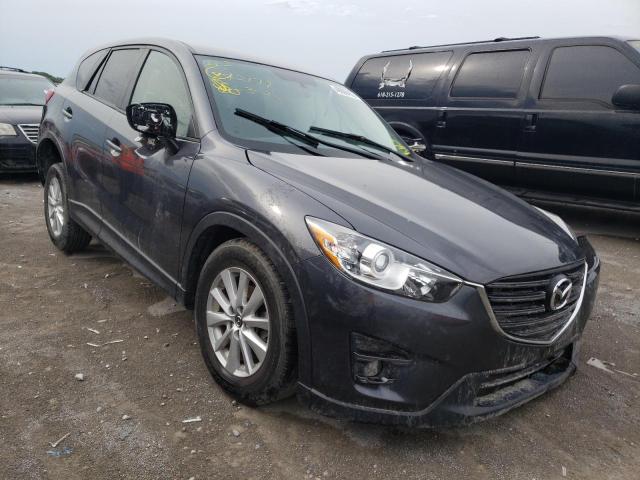 MAZDA CX-5 TOURI 2016 with VIN JM3KE2CY9G0913350 - Photo from auction