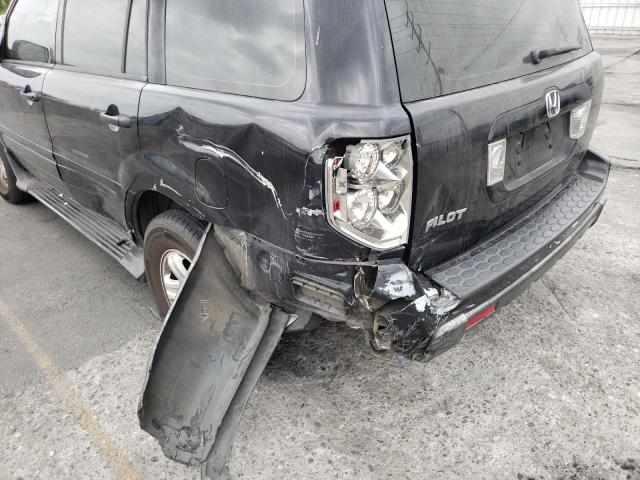 Photo 9 from auction – 2006 HONDA PILOT LX with VIN 5FNYF281X6B016551