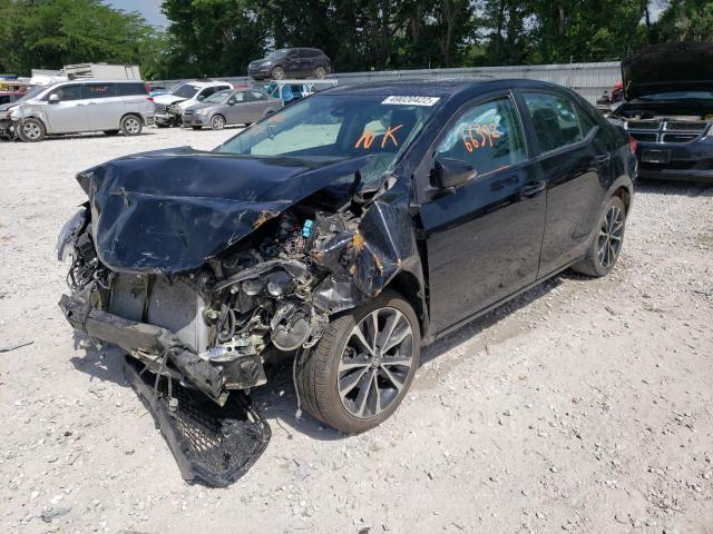 Photo 2 from auction – 2018 TOYOTA COROLLA L with VIN 5YFBURHE6JP815456