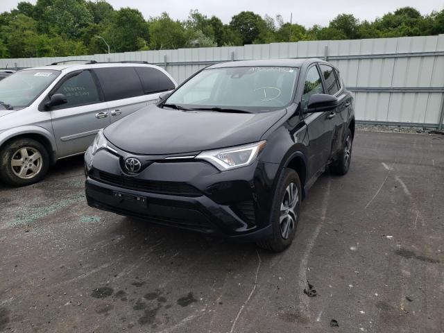 Photo 2 from auction – 2018 TOYOTA RAV4 LE with VIN 2T3BFREV5JW792871