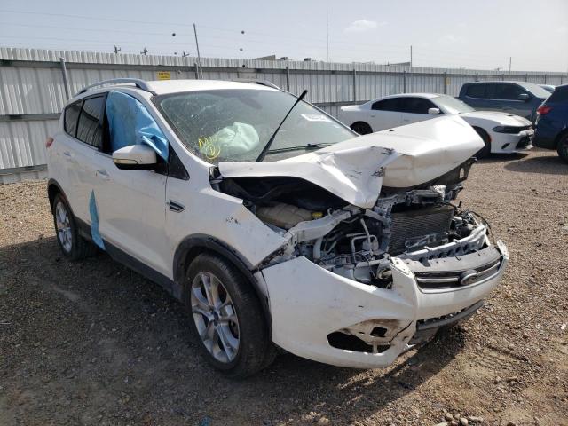 FORD ESCAPE TIT 2014 with VIN 1FMCU0J99EUA54536 - Photo from auction