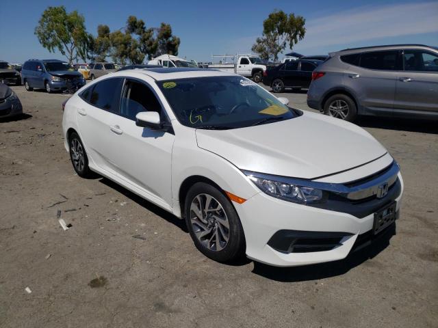 HONDA CIVIC EX 2018 with VIN 19XFC2F71JE206535 - Photo from auction