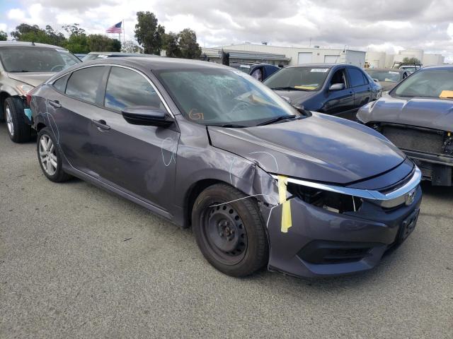HONDA CIVIC LX 2018 with VIN 2HGFC2F5XJH571753 - Photo from auction